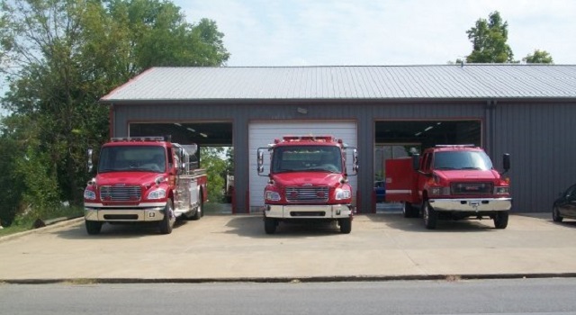 Fire trucks outside the fire department building.